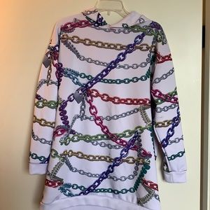 White fashion nova top with chains